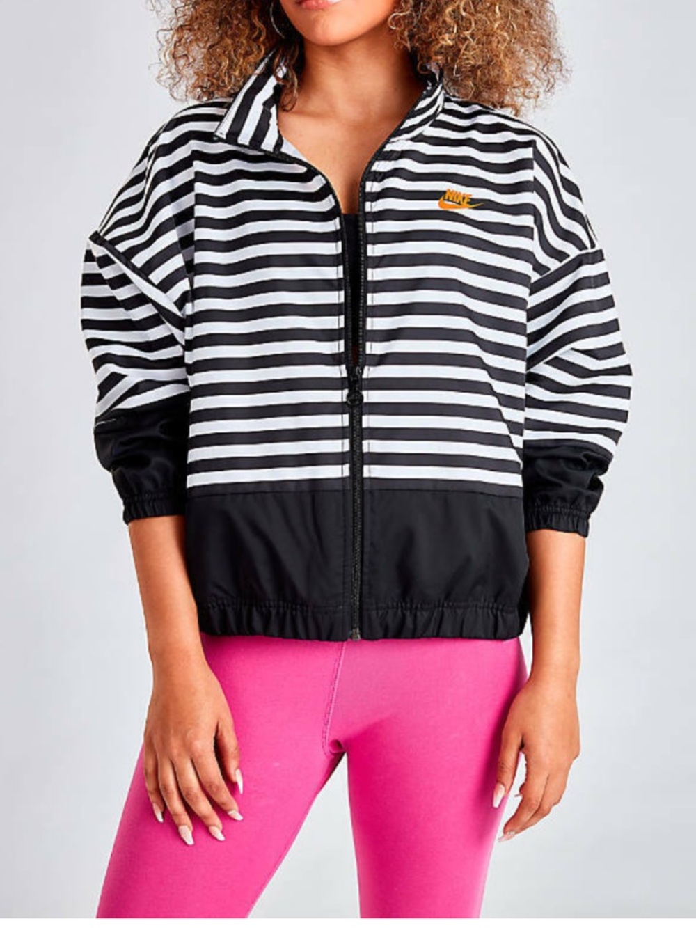 Nike Women's Black & White Striped Bomber Jacket with Gold Logo